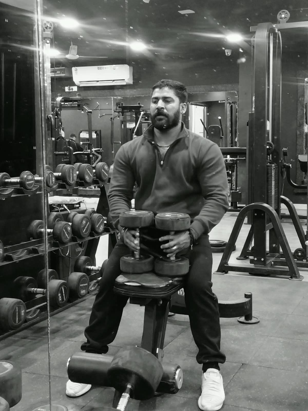 Sanjay Purbia training with dumbbells