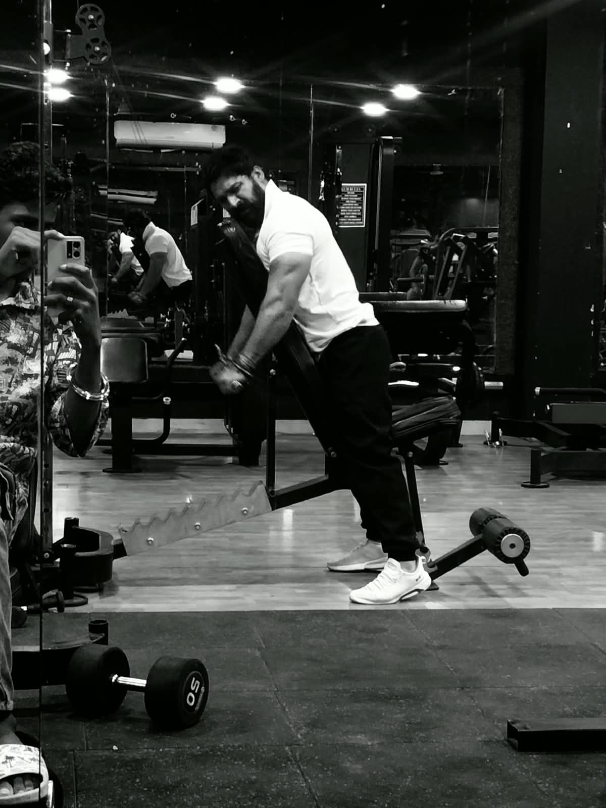 Sanjay Purbia demonstrating a strength exercise